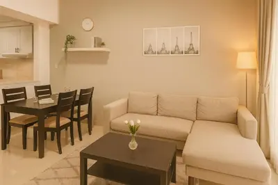 a living room with a couch and a table at 1 Bhk Huge Apartment In Heart of Dubai Marina in Dubai