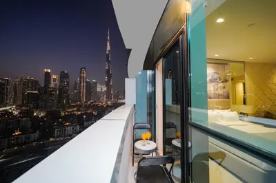 a balcony with a view of a city skyline at Studio with Burj Khalifa view in Dubai