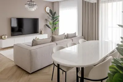 a living room with a white couch and a table at Beautiful 2 bed in JBR SHAMS in Dubai