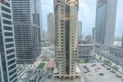 a view of a busy city with tall buildings at Chic Studio at ME DO RE Tower Stunning Views in Dubai
