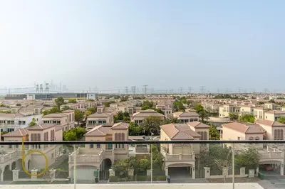 arial view of a city with houses and buildings at Bookable - Studio Room, Bali Residences JVT in Dubai