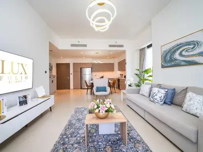 a living room with a couch and a table at Stunning 2 bed dubai mall burj khalifa downtown ACT 1 in Dubai