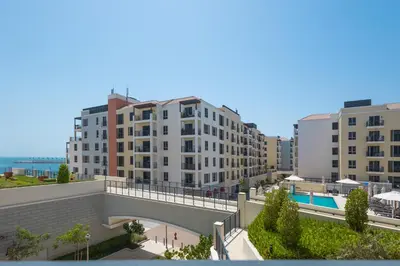 arial view of a city with tall buildings at Port de la Mer Luxury Sleeps 4Person in Dubai
