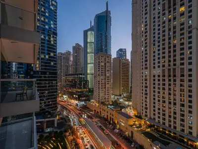 a view of a city at night with traffic at Continental Tower Luxury 2BR Dubai Marina Views in Dubai