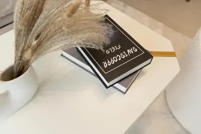 a book sitting on top of a table at Binghatti Amber in JVC, 15 Min to Marina in Dubai