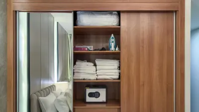 a closet with a bunch of towels in it at Large Flat in High Floor with view to Marina Canal & Beach sleep 8px in Dubai