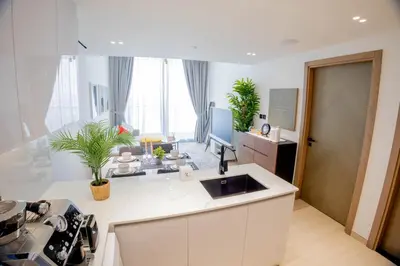 a kitchen with a sink and a counter top at Binghatti Corner in Dubai