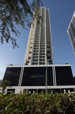 a tall building with a lot of windows at Modern 1BR Apt in Binghatti Gardenia with Pool & Gym! in Dubai