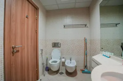 a bathroom with a toilet and a sink at Stylish 1BHK in Sulafa Tower at Dubai Marina in Dubai