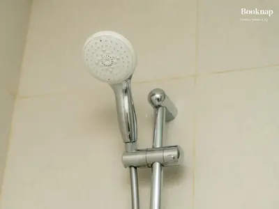 a shower head on a wall in a bathroom at Luxury 1BHK Apartment at DAMAC Prive A, Business Bay in Dubai