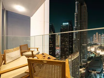 a balcony with a view of a city skyline at Forte Suites by Prestige Nest in Dubai