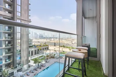 a balcony with a view of the city from a building at STAY BY LATINEM Luxury 1BR Holiday Home CVR B 602 near Downtown in Dubai