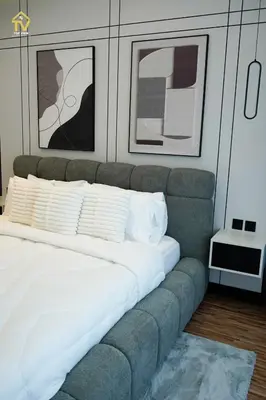 a bed with white sheets and pillows in a room at TOP VIEW Luxury 2 bedrooms in Dubai only families in Dubai