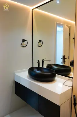 a bathroom with a black sink and a mirror at TOP VIEW Luxury 2 bedrooms in Dubai only families in Dubai