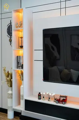 a living room with a tv in a white cabinet at TOP VIEW Luxury 2 bedrooms in Dubai only families in Dubai