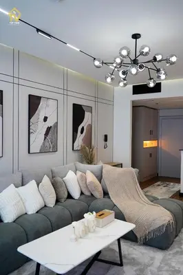 a living room with a couch and a table at TOP VIEW Luxury 2 bedrooms in Dubai only families in Dubai