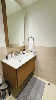a bathroom with a sink and a mirror at Apartment In Creek Beach in Dubai