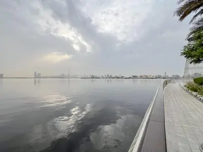 a large body of water with a city in the background at Frank Porter - Bayshore at Creek Beach Building 4 in Dubai