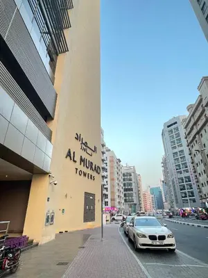 a car parked in front of a building at Luxurious 1 Bedroom Apartment in Heart of Dubai in Dubai