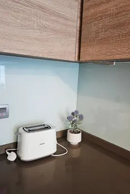 a toaster sitting on a counter in a kitchen at Modern New Sea View 1 BR Apartment in Dubai