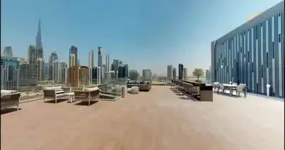 a building with benches and a view of a city at Water Front, State of the Art Furniture, Burj View sleeps 4 in Dubai