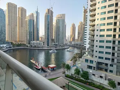 a view of a river in a city with buildings at MARINA VIEWs STUDIO APARTMENT in Dubai