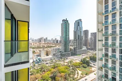 a view from a window of a city at Modern 2BR with Private Pool, Near Circle Mall And Quick Access from Al Khail Road, Binghatti Tulip, JVC by Deluxe Holiday Homes in Dubai