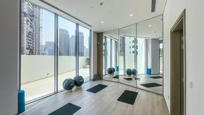 a yoga room with a lot of windows at Exclusive 1BR, Panoramic Marina View, Dubai Marina - 21AB02 in Dubai
