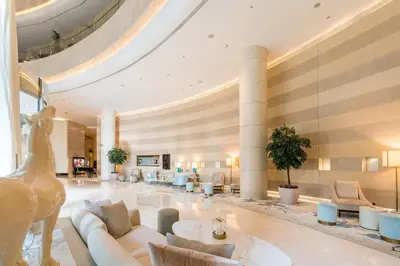 a lobby of a hotel with couches and chairs at JW Marriott Marina Residences in Dubai