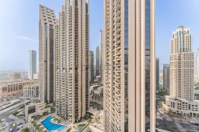 an aerial view of tall buildings in a city at Apartment near Burj Khalifa and Dubai Mall, Central Location, Minutes to Dubai Marina and Palm Jumeirah - 8 BLVD Walk, Downtown Dubai by Deluxe Holiday Homes in Dubai