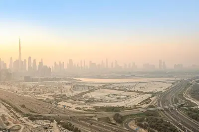an aerial view of the city of dubai on a polluted day at FIRST CLASS 4BR Sobha Skyline Luxury in Dubai