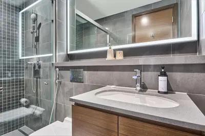 a bathroom with a sink and a shower at STAY BY LATINEM Luxury 1BR Holiday Home CB 1409 Near Burj Khalifa in Dubai