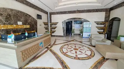 a lobby with a dart board on the floor at DRUVYA HOLIDAY HOMES, Marina Diamond 1, Close to Sobha Realty Metro 3 min walkable in Dubai