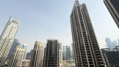 a view of a large city with tall buildings at Premium 2bed Apartment In Downtown Act1 Tower in Dubai