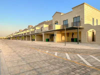 an empty street in front of a building at FIRST CLASS VILLA Hidden Luxury Gem in Dubai