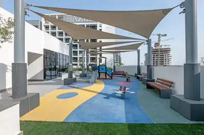 a playground on the roof of a building at Vibrant Studio Your Perfect Stay Awaits in Dubai