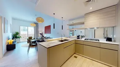 a kitchen with a sink and a counter top at Vacationer l Upgraded 1 Bedroom l near Circle Mall in Dubai