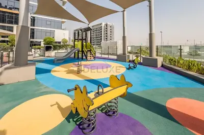 a rendering of a playground with a slide and a slidektop at Close to Meydan Racecourse and Ras Al Khor Wildlife Sanctuary, And a Quick Drive to Downtown Dubai and the Iconic Burj Khalifa - Azizi Riviera 44, Meydan by Deluxe Holiday Homes in Dubai