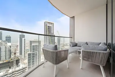 a living room with a view of a city at VayK - Stunning 2BR Apt with 2 Balconies in Downtown in Dubai
