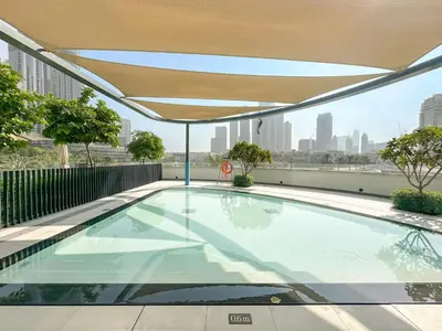 a swimming pool on the roof of a building at VayK - Stunning 2BR Apt with 2 Balconies in Downtown in Dubai
