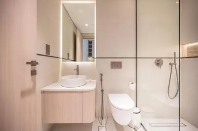 a bathroom with a toilet and a sink and a shower at Modern Studio Apartment for Rent Fully Furnished in Dubai