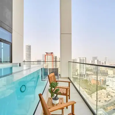 Modern 2BR Retreat in JVC with Private Pool Balcony