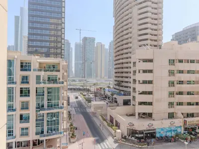 an aerial view of a city with tall buildings at Luxury in Dubai Marina 1BR beside Vida Yacht Club in Dubai