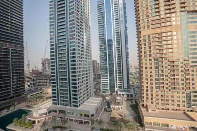 a view of a city with tall buildings at JLT Laguna Tower Spacious Studio with Lake View for 4 Guests in Dubai