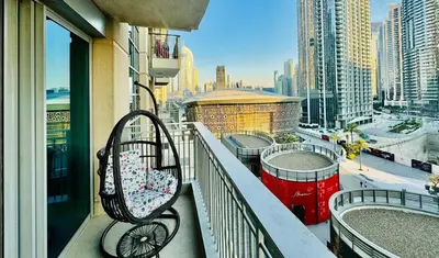 a balcony with a view of a city at Modern Apartment standpoint near dubai opera in Dubai