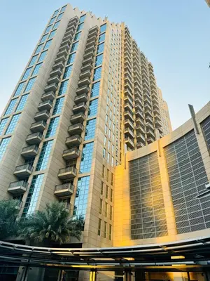 a tall apartment building with a lot of windows at Modern Apartment standpoint near dubai opera in Dubai