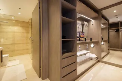 a bathroom with a shower and a toilet at Luxury 1BR at Sterling East , Burj Khalifa Views in Dubai