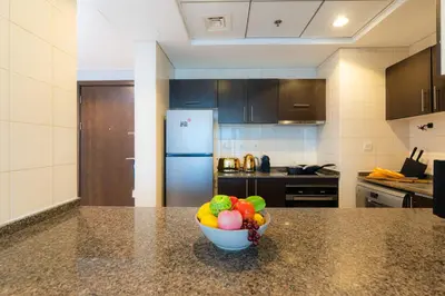 a bowl of fruit on a counter in a kitchen at Great Location - Stunning Views - Scenic in Dubai