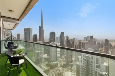 a balcony with a view of the city at Luxe High-Rise with Burj Khalifa and Sunset view in Dubai