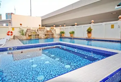 a large swimming pool on top of a building at SkyHigh 4BR Penthouse Marina Views & Game Lounge Pool Table PS5 in Dubai